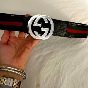 Unisex Gucci Belt. Red/Green black leather belt with silver Gucci logo.